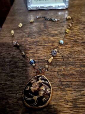MAWI Brown and Blue Carved Teardrop Pendant Necklace